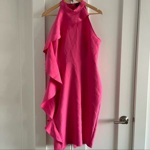 Bright pink sleeveless dress with major ruffle detail